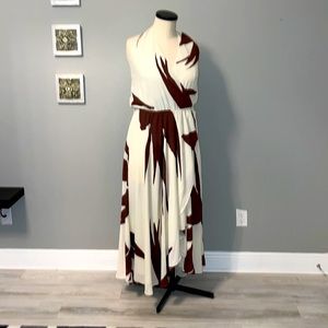 Brown and beige wrap dress. Soft full shirt.  Fitted top. Needs belt